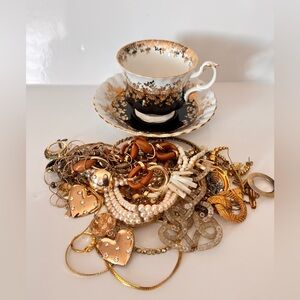 Elegant bundle of gold black tee cup and mixed jewelry lot